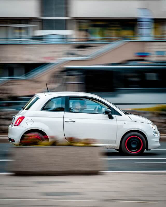 Picture of fiat speeding down road